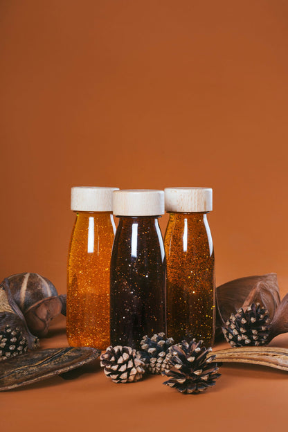 Bouteille sensorielle à paillettes - curcuma